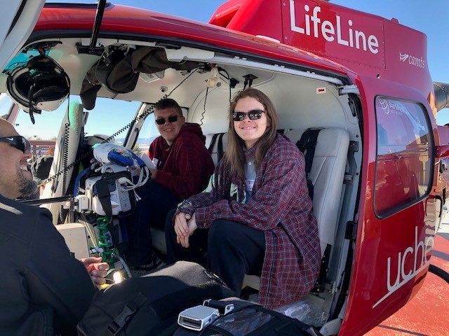 Two AVC students sit in a Flight for Life helicopter during a field trip.